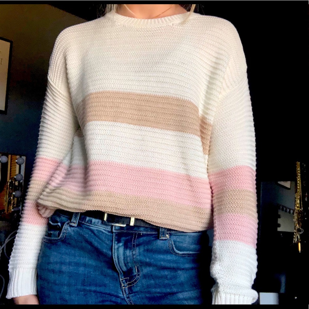 Really cute sweater. Fits nicely